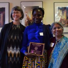 From left: Professor Sasha Welland, Harriet Dumba '04, and Professor Priti Ramamurthy. Harriet is holding 2022 GWSS Alumni Award Plaque.