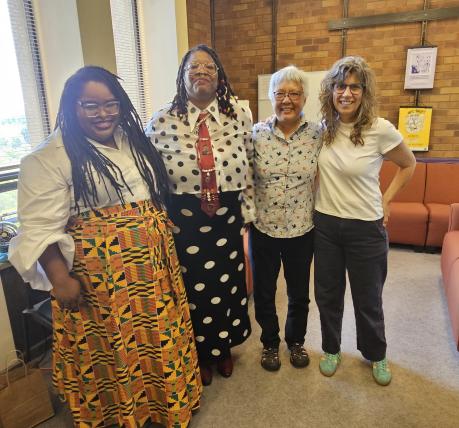 Dr. KT standing with their committee members