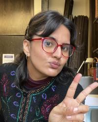 Kanu with a pout & millennial victory sign 