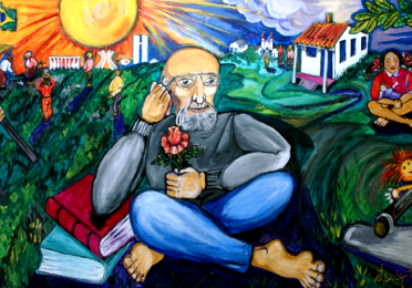 A vibrant painting depicting Brazilian educator Paulo Freire, a leading advocate of critical pedagogy. He sits cross-legged holding a rose, surrounded by books, rural workers, and scenes of education and liberation.