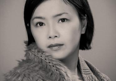 Portrait of writer and researcher Shuxuan Zhou, recipient of a 2025 Artist Trust GAP award.