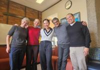 Marielle Marcaida celebrating with her dissertation committee — Cricket Keating, Amanda Swarr, Chandan Reddy, and Rick Bonus — after passing her PhD general exams.