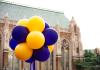 Gold and purple balloons in front of Suzzallo Library