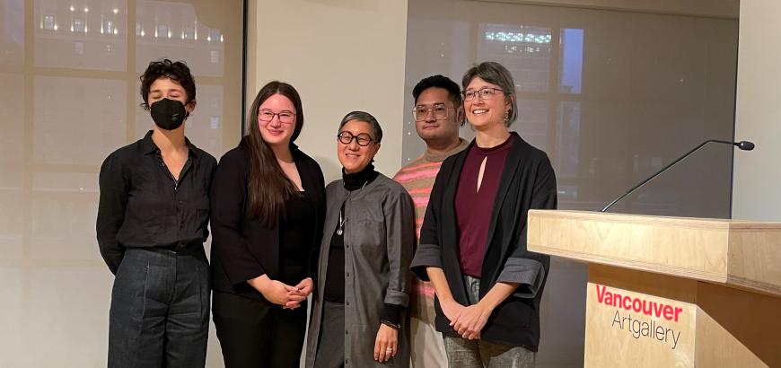 Sasha Welland standing with the three panelists and artist Jin-me Yoon smiling for camera pictures